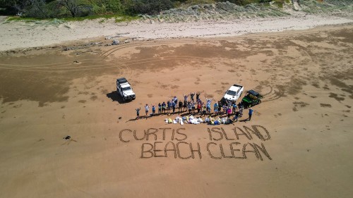 ConocoPhillips Australia employees and their families at the Curtis Island Beach Clean in 2021.